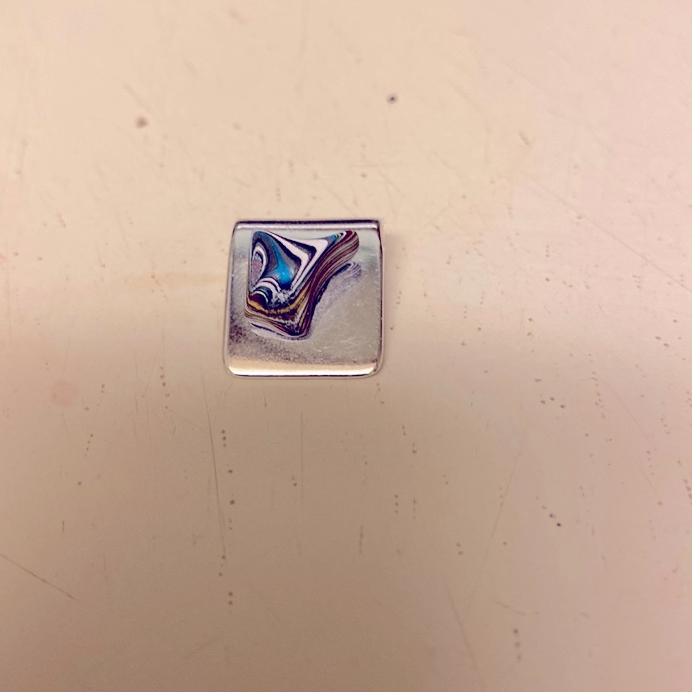 Fordite charm
